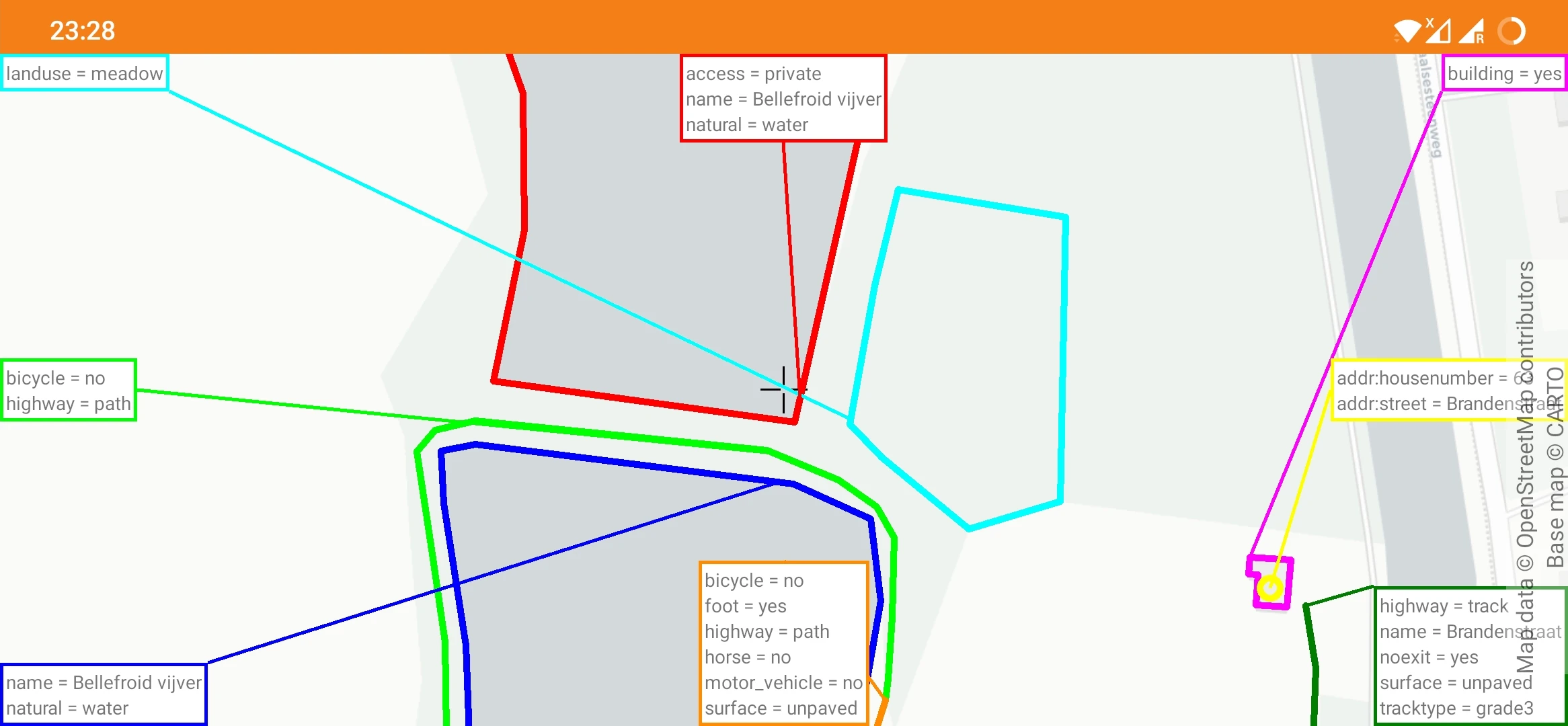 Screenshot of OSMfocus, showing how OpenStreetMap data for lakes and buildings
is revealed on a map